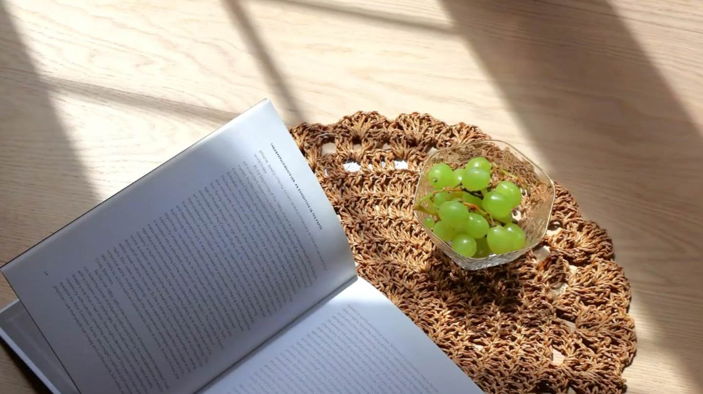 OAK ENGINEERED HARDWOOD FLOOR with book and Green Grape